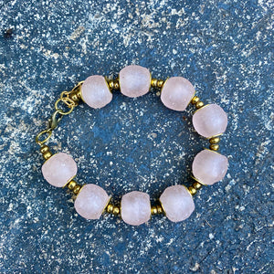 Blush Pink Recycled Glass Bracelet: Handcrafted eco-friendly jewellery made from recycled glass, showcasing a delicate blush pink hue. Sustainable fashion for conscious individuals. Adjustable design for a perfect fit. Australian-made.